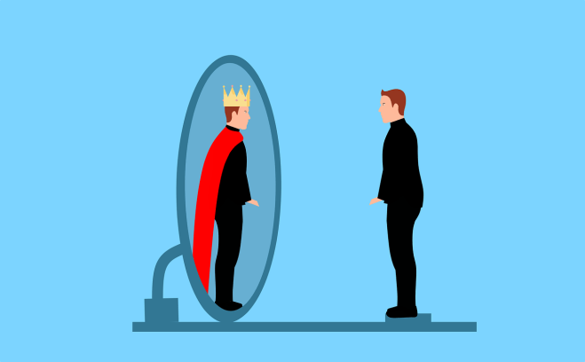 man sees himself in mirror as king